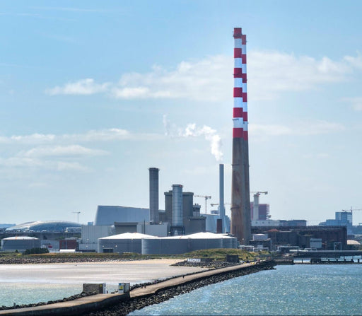 Dublin skyline showing the Great South Wall and the Poolbeg Chimneys, the cover of the book 'On Dublin' by Louise East and Deanne Fitzmaurice.