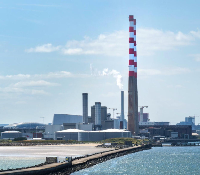 Dublin skyline showing the Great South Wall and the Poolbeg Chimneys, the cover of the book 'On Dublin' by Louise East and Deanne Fitzmaurice.